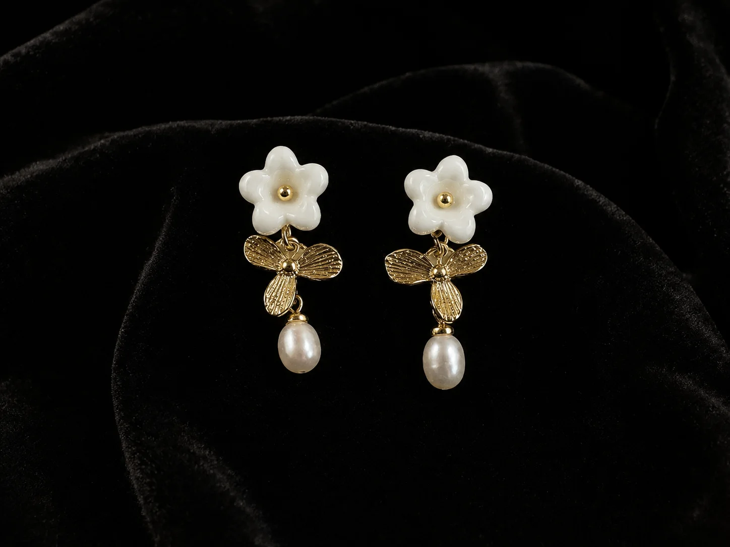 Dew Blossom handmade ceramic earrings showing a hand-finished ceramic surface by ZELIN ART.
