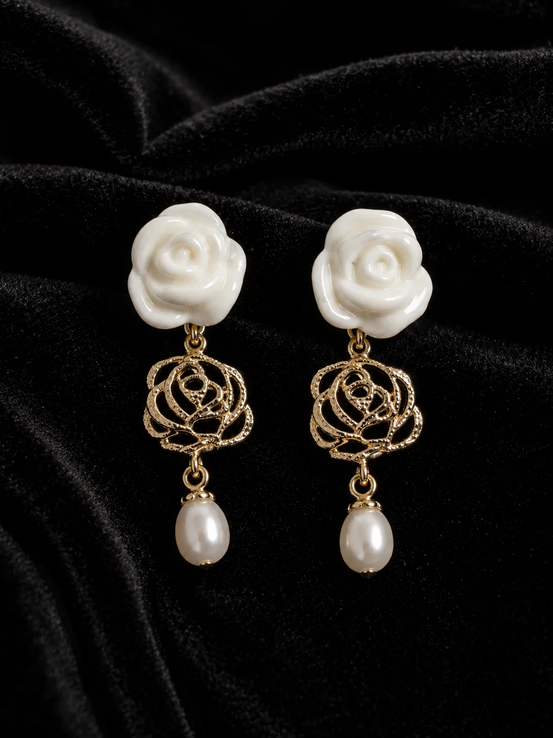 Golden Petal handmade ceramic earrings showing a hand-finished ceramic surface by ZELIN ART.
