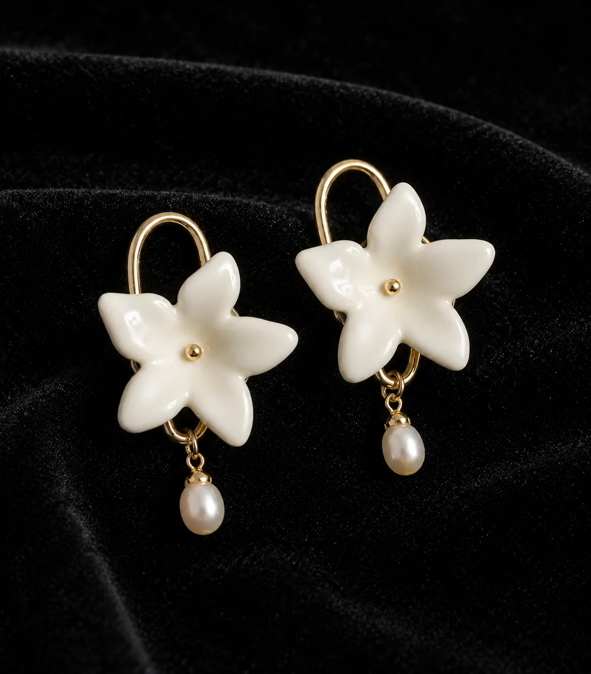 Quiet Bloom handmade ceramic earrings showing a hand-finished ceramic surface by ZELIN ART.