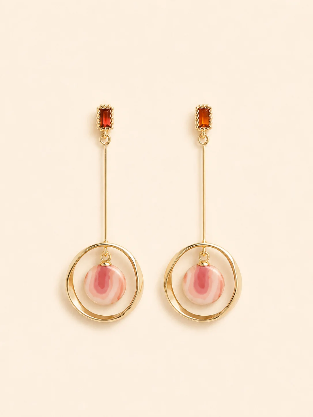 Rose Orbit handmade ceramic earrings showing a hand-finished ceramic surface by ZELIN ART.