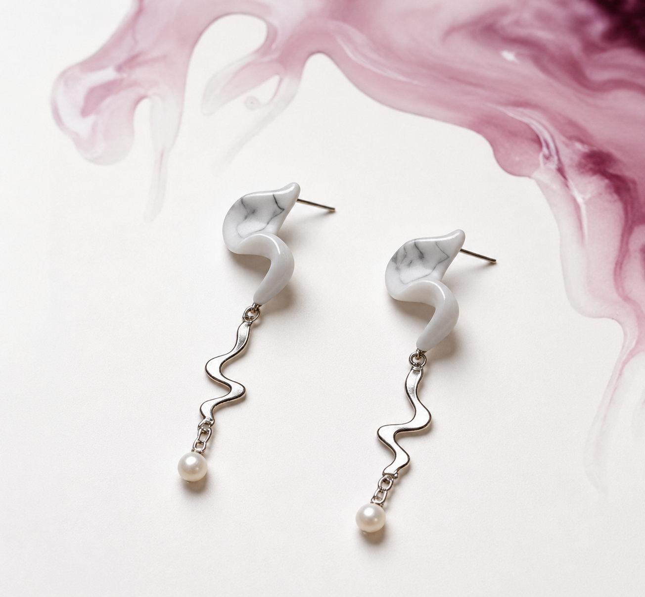 Whispering Ink Drop handmade porcelain earrings showing ink-like ceramic marbling and pearl detail by ZELIN ART.